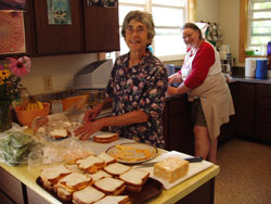 Sue and Louisa prepare lunch